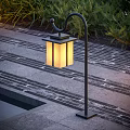 Outdoor Path Light with Square Design Warm Yellow Shade and Black Metal Pole in Garden