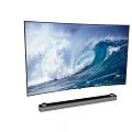 Wall Mounted Television with Ocean Wave Display and Soundbar Below