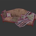 Brown Sofa With Various Patterned Pillows And Striped Blanket On Wooden Armrests