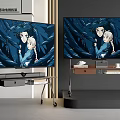 Two Large TVs Displaying Anime Characters On Modern Wheeled Stands With Books And Cups