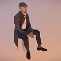 Man sitting on chair wearing hat jacket white shirt dark pants shoes against light background