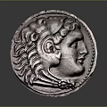 Ancient Silver Coin With Detailed Profile Head And Intricate Carving Design