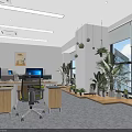 Modern Public Office Area With Workstations Computers Greenery Bright Lighting And Large Windows
