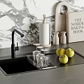 Sleek Black Kitchen Faucet Above Sink On Countertop With Marble Wall Apples And Glass Rack