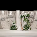 Elegant Floral Decoration for Wedding Stage with Bride Beige Curtains and Crystal Chandeliers