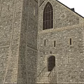 Ancient Historic Building With Stone Walls Spire Tower And Gothic Windows