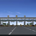 Large Toll Station Building With Multiple Lanes And Cars Under Clear Blue Sky