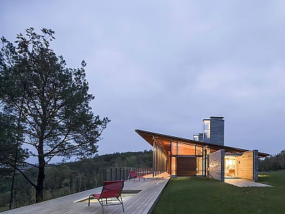 Modern Guesthouse Architecture With Sloped Roof Wooden Exterior Red Chairs On Lawn And Hills 3d model