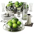 Fresh Green Limes in Glass Bowl with Metal Containers Glassware Caravaggio Book on Silver Trays