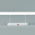 Light Blue Desk Lamp With Silver Stands White Bar And Red Logo On Base