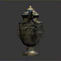 Carved Sculpture Vase With Winged Decorations Golden Lid And Relief Figures