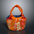Stylish Orange Handbag With Floral Embroidery And Decorative Knot Handles For Everyday Use