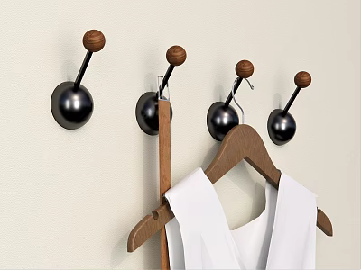 Wall Mounted Hooks With Black Base And Wooden Knobs Near Wooden Hanger Holding White Garment 3d model