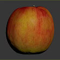 Juicy Ripe Red and Yellow Apple on Dark Background with Shiny Surface