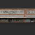 Urban Building Complex Featuring Kanopado Store With Brick Facade And Sign