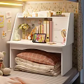 Cozy White Desk with Tablet Books Vase and Stacked Blankets Underneath