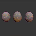 Three Decorative Egg Shaped Sculptures with Gold Specks and Blue Gray Texture