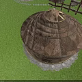 Circular Landscape Sculpture with Woven Texture Set On Sandy Ground Stone Border and Surrounding Structures
