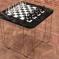 Stylish Entertainment Table with Black Marble Top Chessboard Pieces Gold Metal Legs on Herringbone Floor