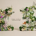 Floral Display Installations With Colorful Flowers Green Foliage And Hanging Vines