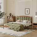 Double Bed With Green Quilt Wooden Headboard In Cozy Bedroom Framed Artwork Plant And Rug