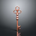 Copper Key With Intricate Design Three Circular Rings And Ornate Handle On Dark Background