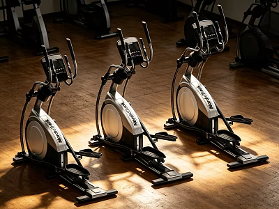 Three Elliptical Fitness Machines with Digital Displays on Wooden Gym Floor 3d model