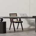 Modern Minimalist Desk Setup With Wooden Chair Laptop And Small Bowl