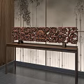 Intricate Wooden Sculpture Carving Displayed on Long Wooden Table With Bamboo Background