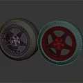 Two Black Car Tires With Alloy Wheels And Spoke Design On Dark Background