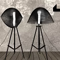 Modern Floor Lamps With Woven Curved Shades Black Tripod Stands Gray Textured Wall Wooden Floor
