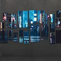 Modern Photo Wall with Various Size Frames Displaying City Night Lights and High Rise Buildings