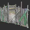 Worn Wooden Fence With Green Support Strips and Various Colored Planks in Cluttered Arrangement