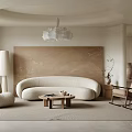 Neutral Living Room Interior With Curved Sofa Rocking Chair And Beige Wall Art