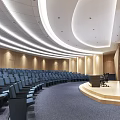 Modern Large Conference Room With Curved Ceiling Blue Seats Large Screen And Podium