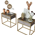 Modern Bedside Tables With Gold Metal Frame Drawer And Decorative Items Including Lamp Stuffed Toy