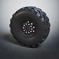 Off Road Tire With Deep Tread Pattern And Wheel Rim Featuring Multiple Holes