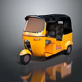 Yellow Three Wheeled Tuk Tuk With Black Roof Seats And Reflective Surface