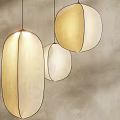 Modern Minimalist Pendant Lights with Oval Shaped White and Beige Design on Gray Wall Background