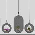 Multiple Hanging Transparent Glass Pendant Lights With Plants And Pink Flowers