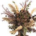 Natural Dried Flower Arrangement In Brown Vase With Green Leaves And Decorative Grasses