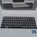 White Dell Laptop Open With Screen Display And Pink Laptop Case On Wooden Floor