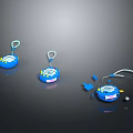 Three Blue Circular Computer Accessories with Lanyard One Disassembled Showing Parts and Small Ball