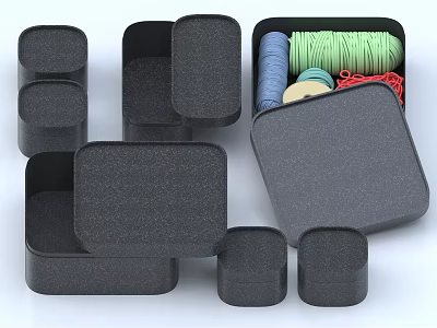 Black Household Storage Boxes In Various Sizes Shapes Containing Colorful Threads 3d model