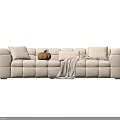Beige Plush Sectional Sofa With Tufted Design Pumpkin Decor And Throw Blanket