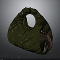 Green Quilted Handbag With Gold Circular Handle And Brown Metal Rivet Panel