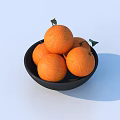 Fresh Oranges in Black Bowl with Green Leaves on Light Blue Surface
