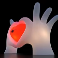 White Hand Shaped Art Installation With Illuminated Red Heart Center