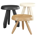 Three Stylish Modern Black White And Natural Wood Stools With Minimalist Design