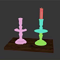Decorative Golden Candle Holders With White Candle On Wooden Base